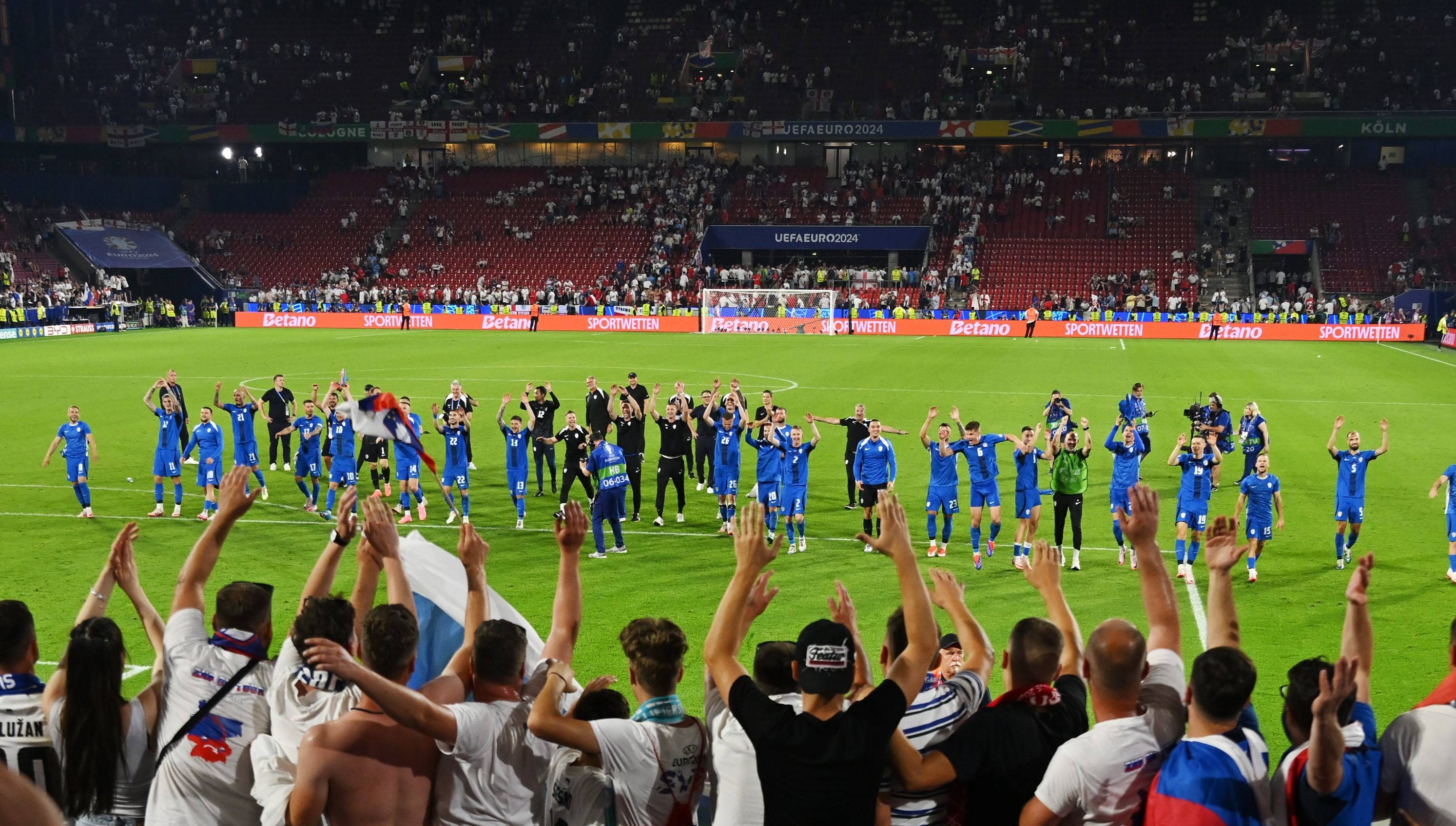 开云下载-斯洛文尼亚队晋级欧洲挑战赛决赛，球迷鼓舞士气！